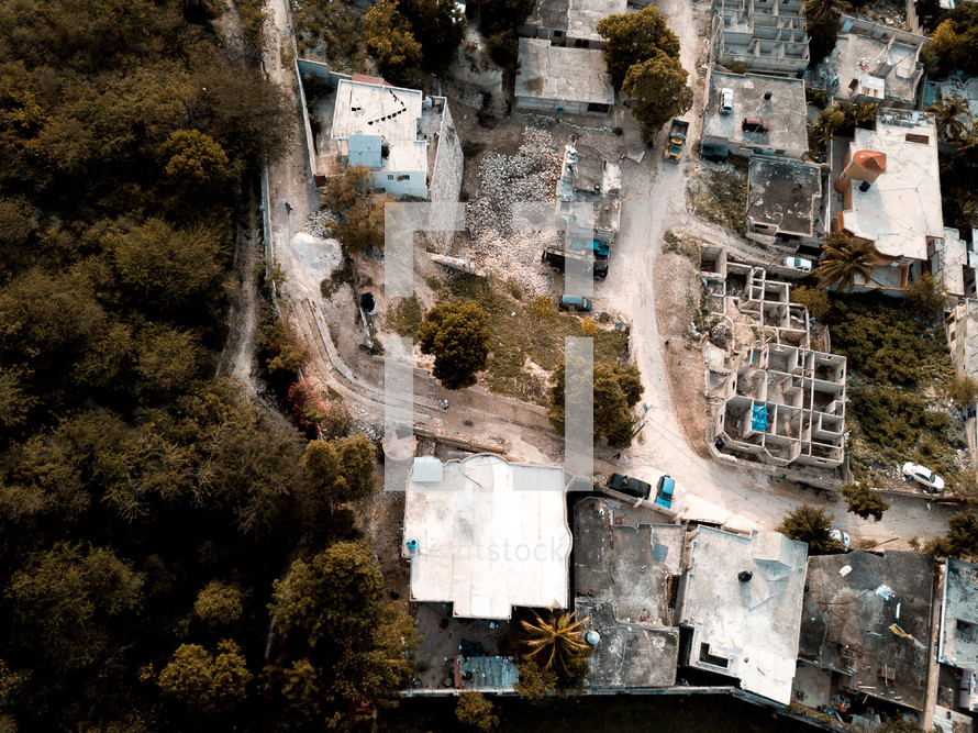 aerial view over houses in a poor town 