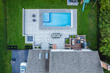 Aerial view of a large house with a pool