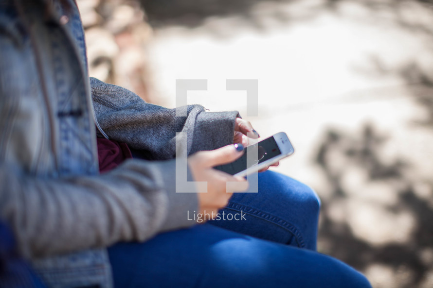 a girl texting on her cellphone