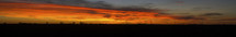 panorama of an orange sky at sunset