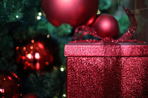 wrapped Christmas ornaments and Christmas tree 