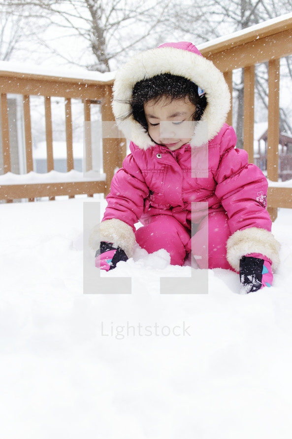 toddler girl in snow 