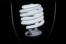 A close-up of an illuminated lightbulb