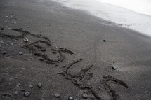 Jesus written in the sand