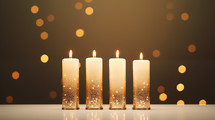 Four Christmas advent candles with bokeh. 