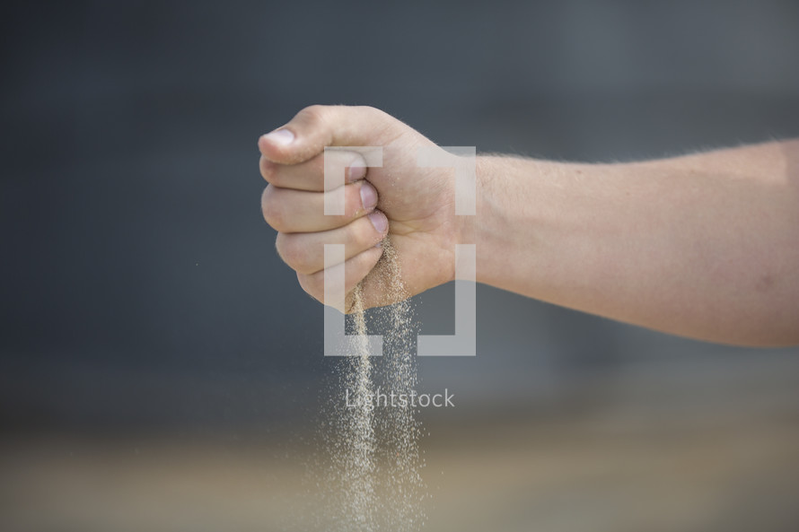 filtering sand in your hand