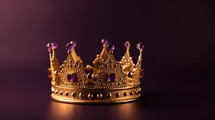 Golden crown with purple jewels on a purple background. 