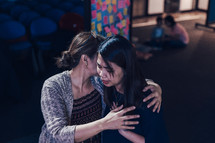 healing hugs during a worship service 