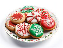 A Plate Full of Red White and Green Christmas Sugar Cookies Isolated on a White Background