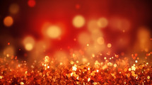 Red glittering background with bokeh. 