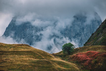 Autumn colors and foggy peak