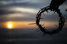 setting sun and crown of thorns 