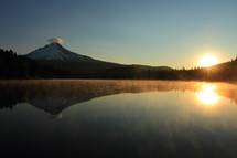 reflection in a lake of mount hood sunrise 