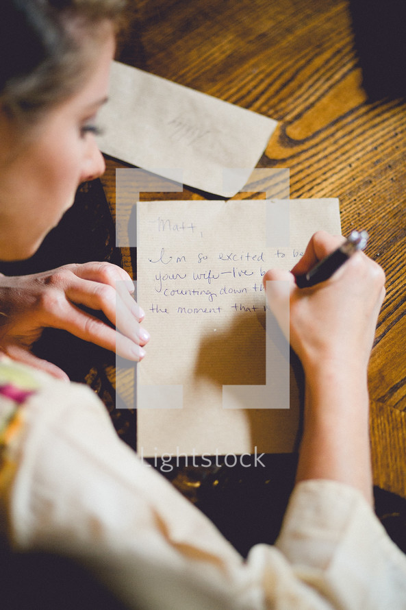 woman writing a letter 