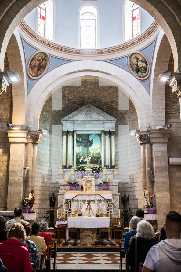 worship service in an ancient church in the holy land 