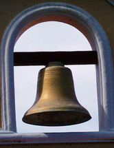 An old church mission bell adorning a mission in the southwestern United States. 