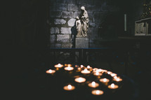 Candles lit inside a church