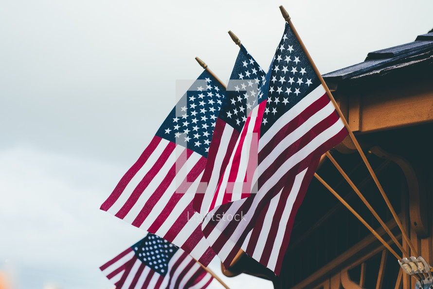 American flags on the side of a house 