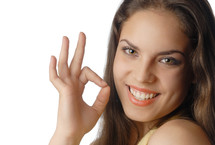 smiling model with OK gesture