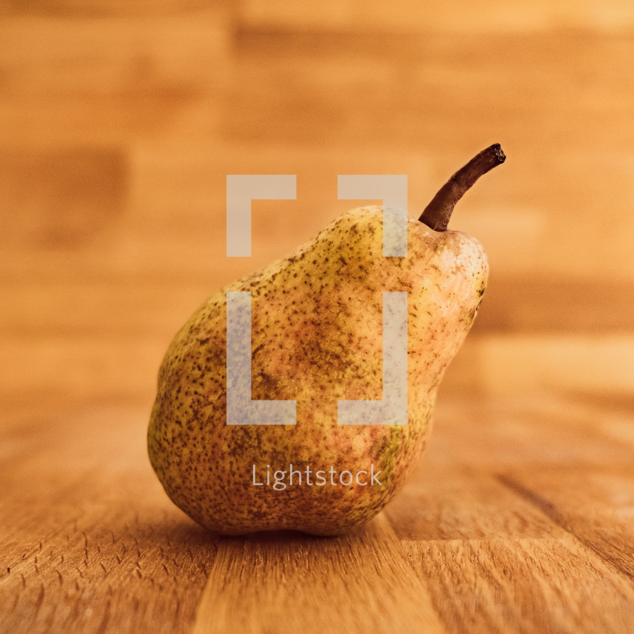 pear on a wood background 