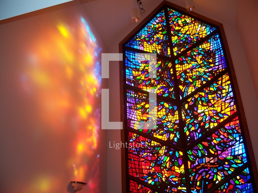 The Healing Window -  chapel with a large stained glass window that reflects the glowing light of Heaven on its walls