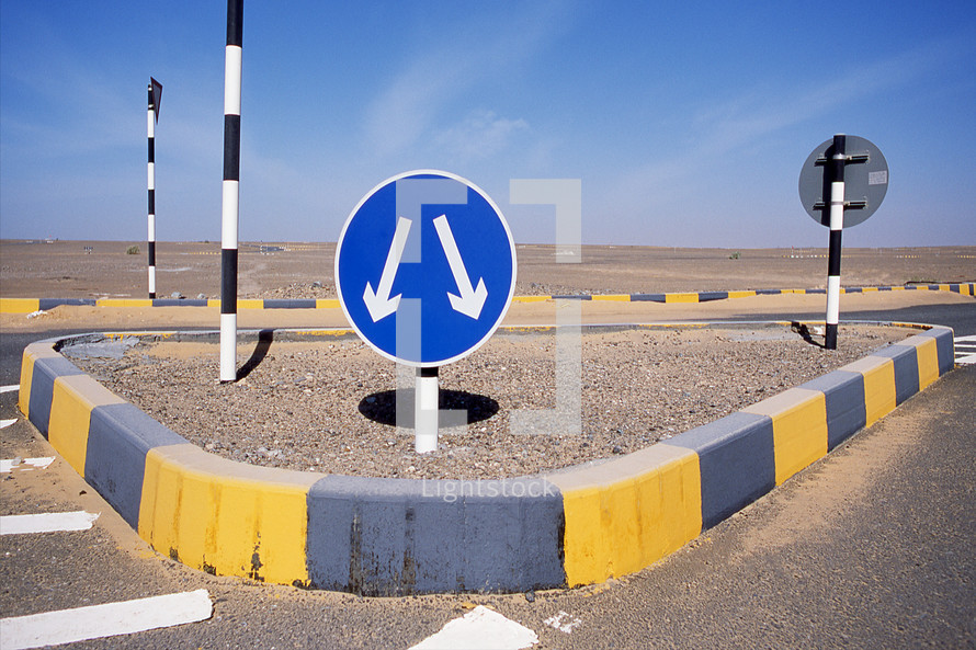 Y crossroad  junction in a desert road.