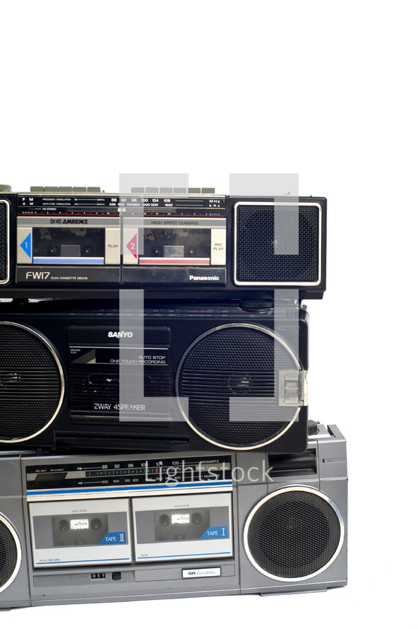 A stack of boomboxes.