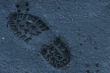 shoe print in the mud 