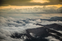 clouds over mountain peaks 