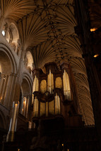 Church organ inside Norwich Cathedral, large pipe organ, beautiful religious architecture