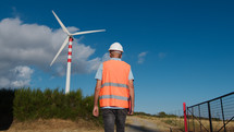 Senior Architect checks the correct functioning of wind turbines