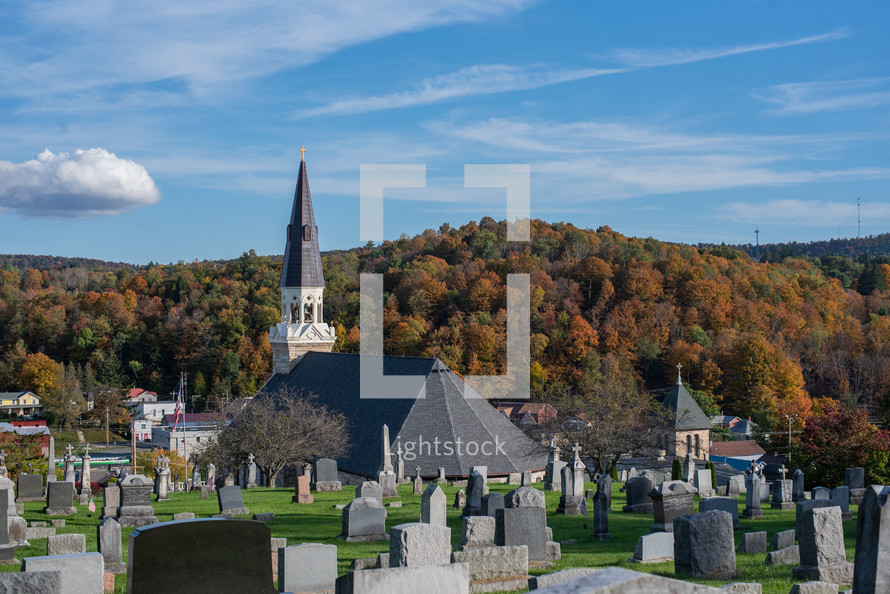 Graveyard near church in the fall