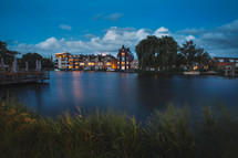 Houses by the river in the evening