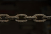 Close up of a rusty, heavy duty chain