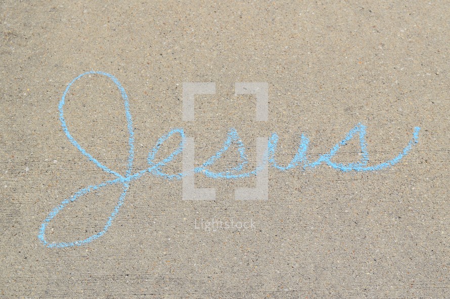 word Jesus in sidewalk 