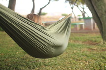 a woman relaxing in a hammock 