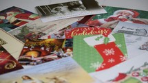 Christmas cards scattered on a table 