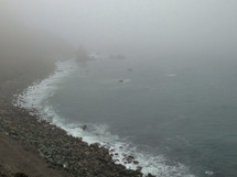 Ocean shoreline in the mist.