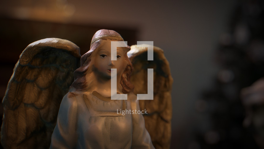 CGI Colorful Christmas Nativity set on coffee table focusing on Angel.