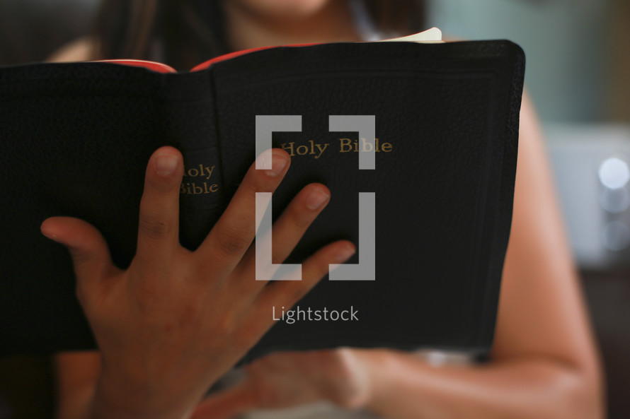 Girl reading Bible
