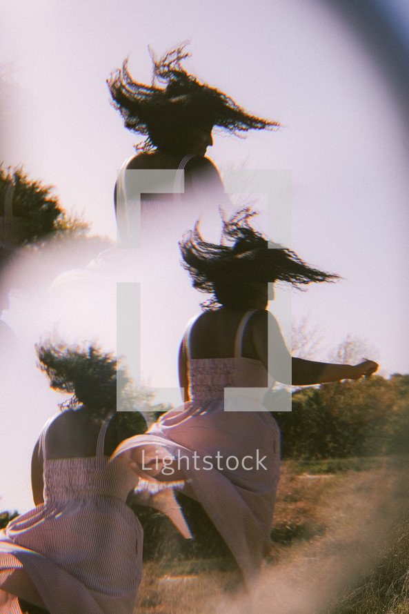 double exposure of a woman dancing 