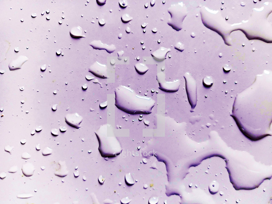 Violet Water Droplets Symbol of life and water creation sea lakes ocean background image