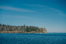 a lighthouse on a cliff 