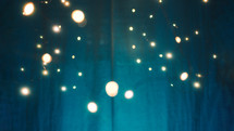 White lights background on blue curtain