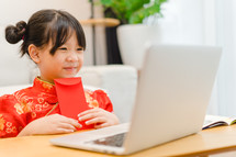 a child using a laptop computer 