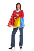 retail therapy - woman holding shopping bags 