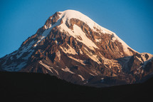 Sunrise light on the snowy peak