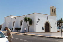 A white adobe church.