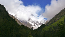 On a sunny day, view of a snowy winter Ushba, Schelda, and other Greater Caucasus mountains,  View from Svaneti, Mestia, Georgia.