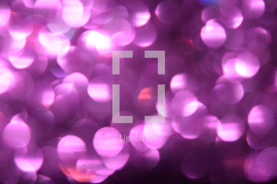 purple bokeh out of focus lights background 